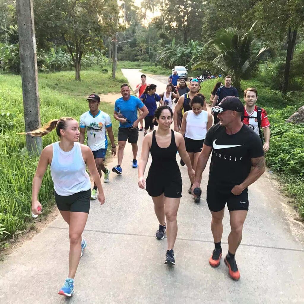 Lamai Fitness Retreat group hiking through the Koh Samui countryside on the morning Buddha Hike